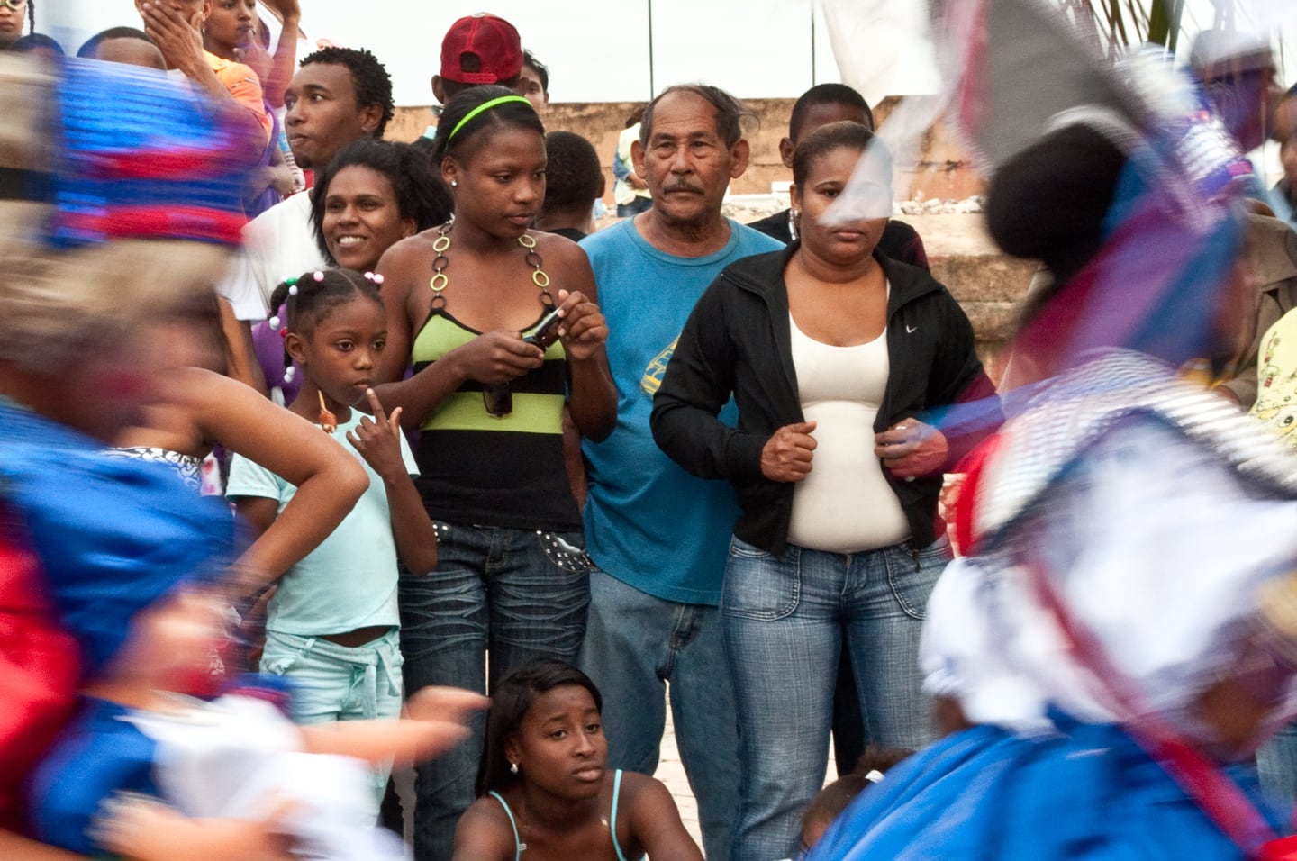dominican family watching parade