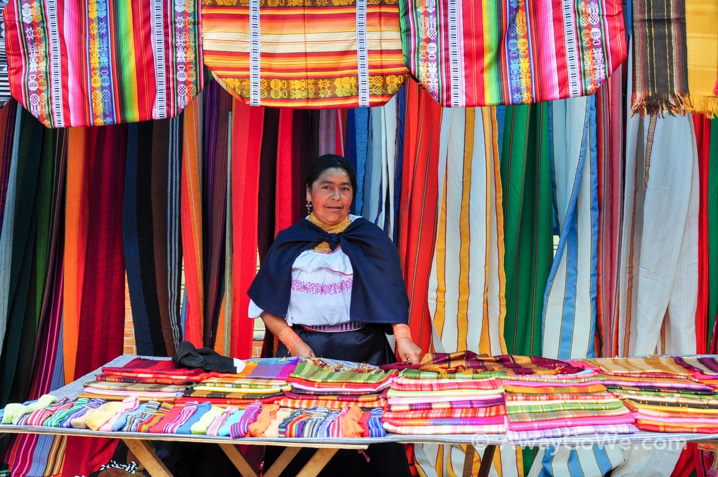 Andean woman and colorful textiles