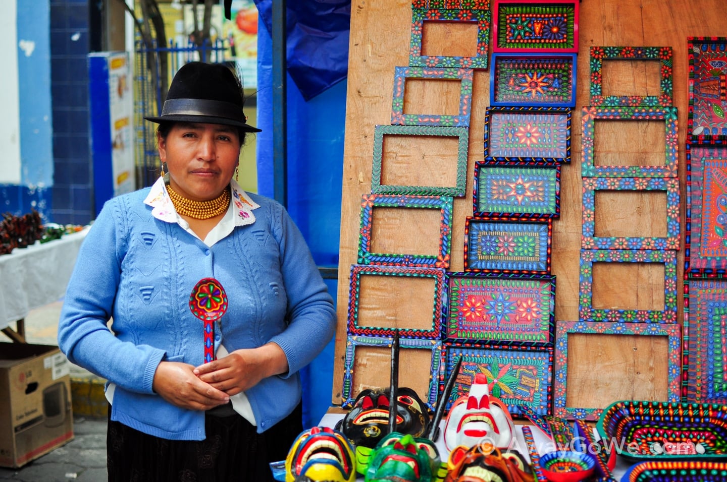 Andean woman with painted handicrafts