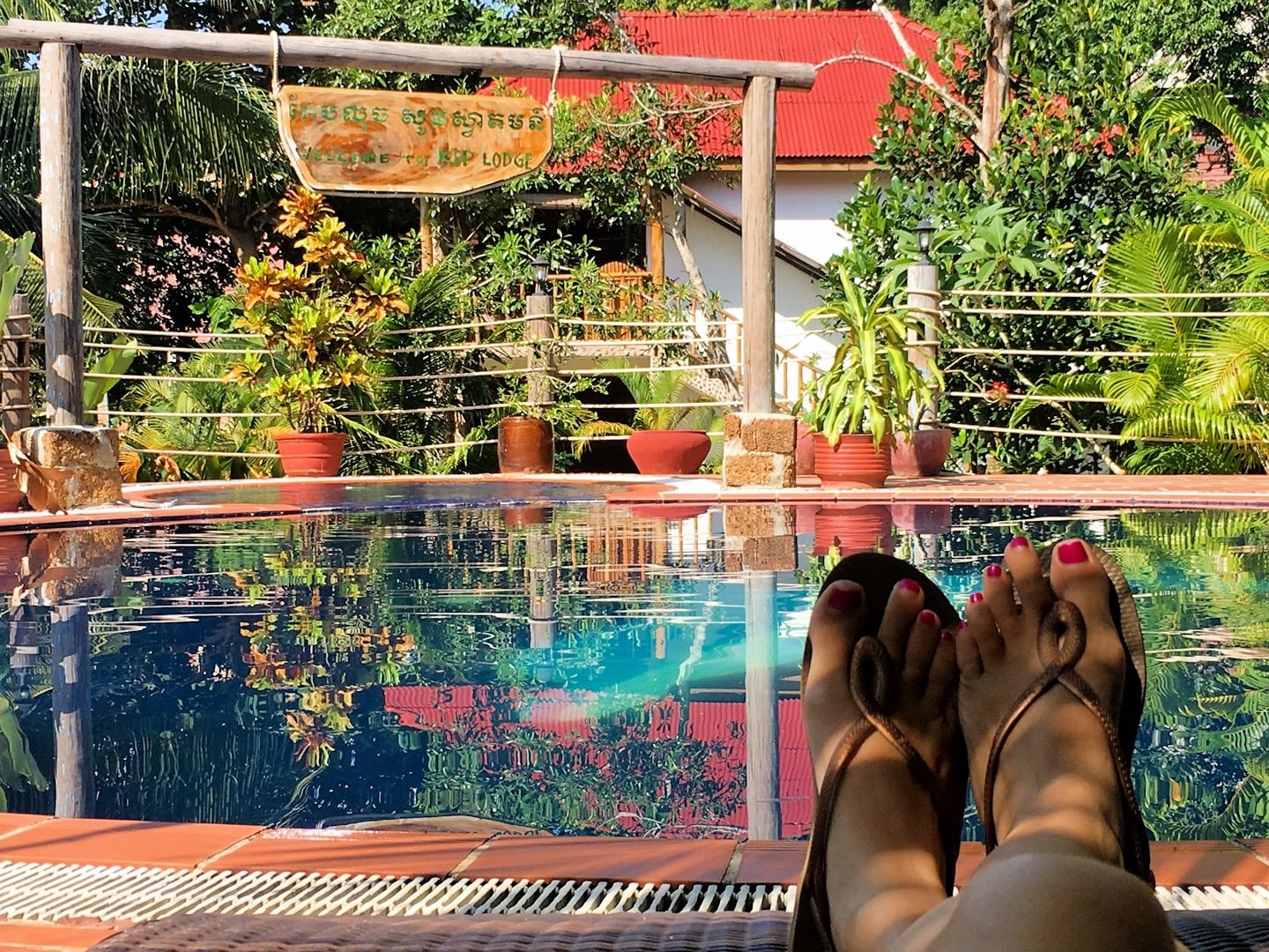 relaxing poolside at Kep Lodge Cambodia